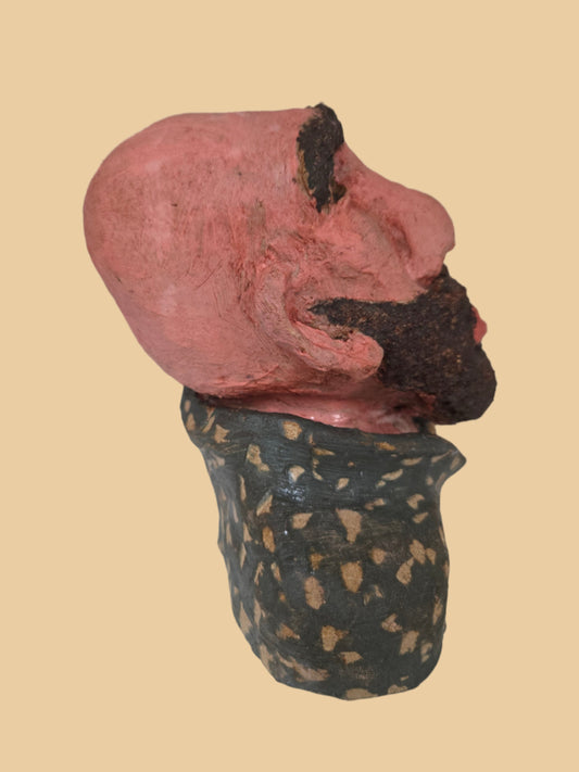 Close-up of a sculptured man