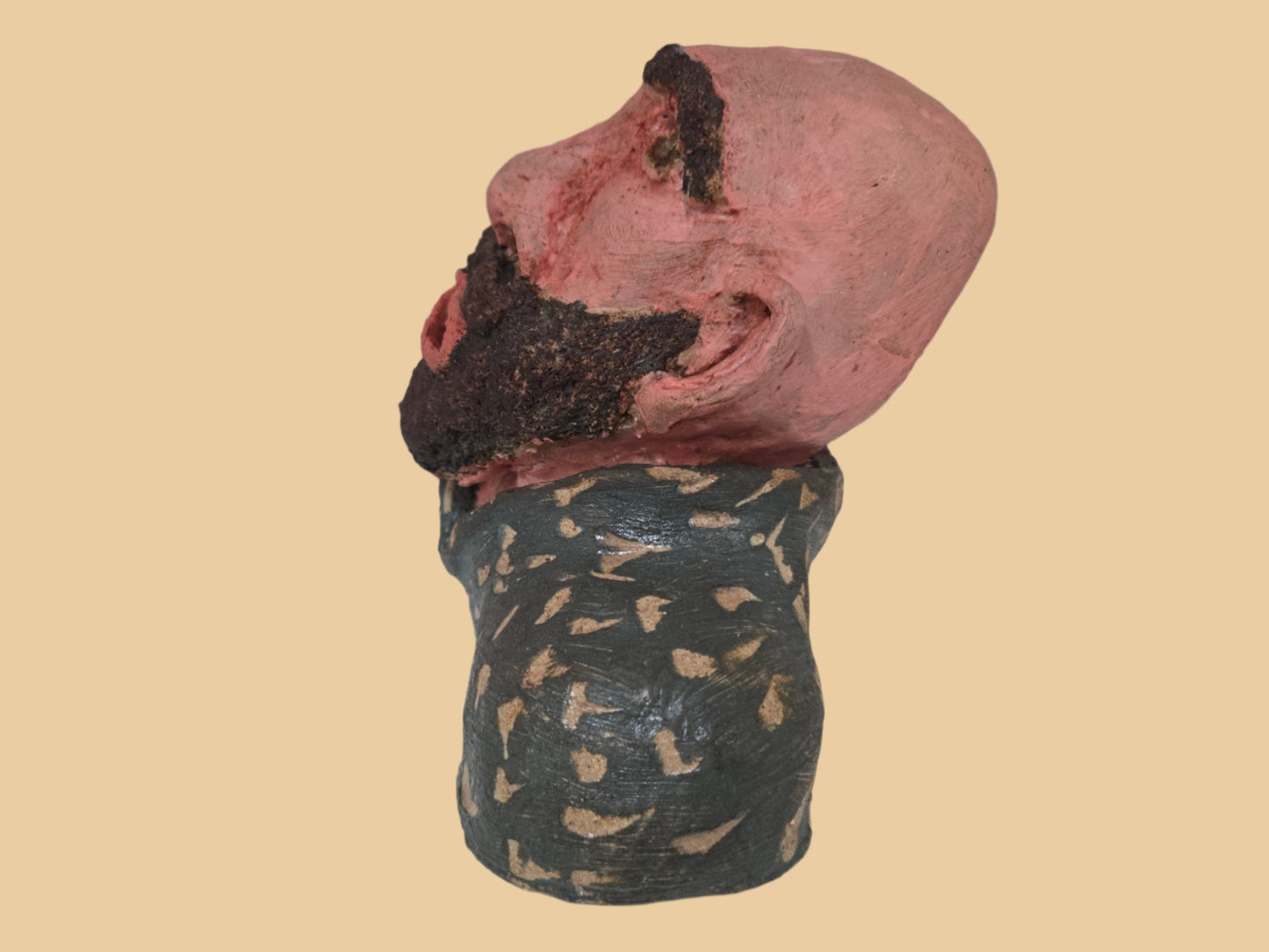Side view of a sculptured man.